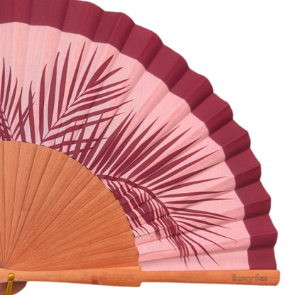 LE BAZAR INOUI Faltfächer aus Holz und Stoff mit rosa und burgunderrotem Palmenblatt-Print für heiße Sommertage